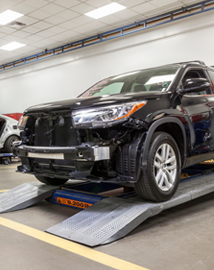 Toyota on vehicle lift | Thousand Oaks Toyota in Thousand Oaks CA